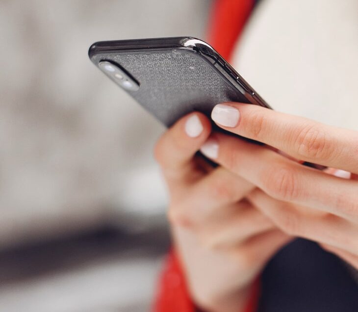 woman-by-building-new woman-by-building-new